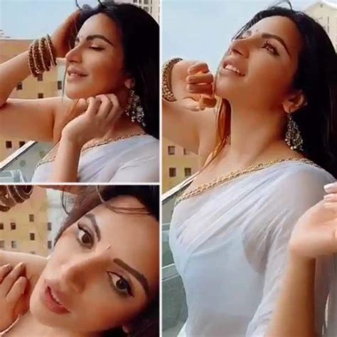 Sexaholic Fame Shama Sikander Enjoys Mumbais First Rain In White Saree Watch Video Read
