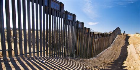 A us border patrol agent walks along the border at the imperial sand dunes, near felicity, california, in november 2016. Bob Worsley Proposes $30 Million U.S.-Mexico Border ...