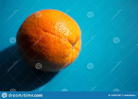 Orange Fruit Over Blue Background With Shadow Stock Image Image Of