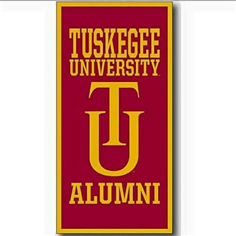 The Logo For Tuskee University Is Shown In Red And Gold On A White