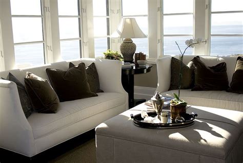 Ocean View Living Room With White Sofas And Brown Pillows Brown Sofa