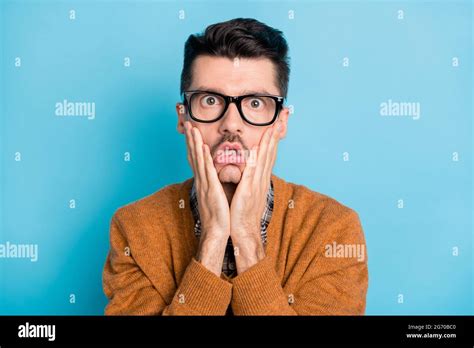 Photo Of Young Man Amazed Shocked Surprised Stupor Hands Touch Cheeks