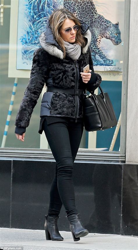 Elizabeth Hurley Wraps Up In A Chic Black Fur Lined Parka In New York
