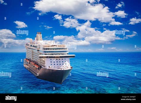 Luxury Cruise Ship Vacation In Blue Azure Sea Sky With Clouds Concept