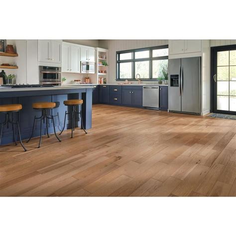 What is the cheapest option available within engineered hardwood? Bruce Hydropel Hickory Natural 7/16 in. T x 5 in. W x Varying Length Waterproof Engineered ...