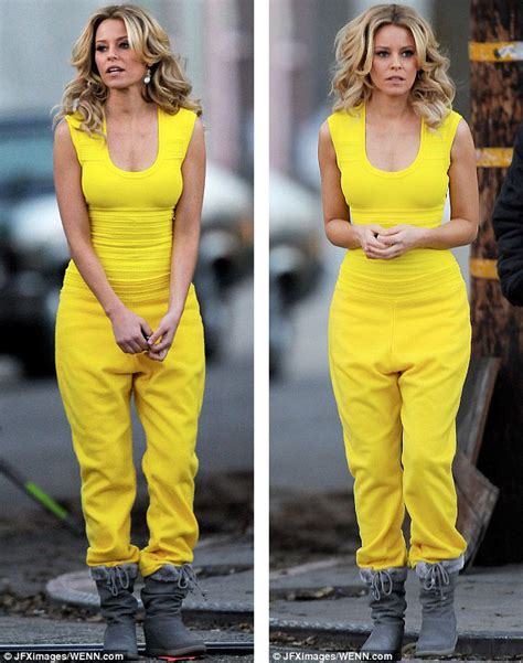 See Here Double Trouble Elizabeth Banks Parades Her Trim Figure In A Yellow Bodycon Dress As