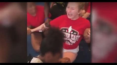 Video Shows Denver High School Cheerleaders Held Down Forced Into Splits