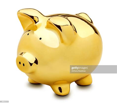 Gold Isolated Piggy Bank High Res Stock Photo Getty Images