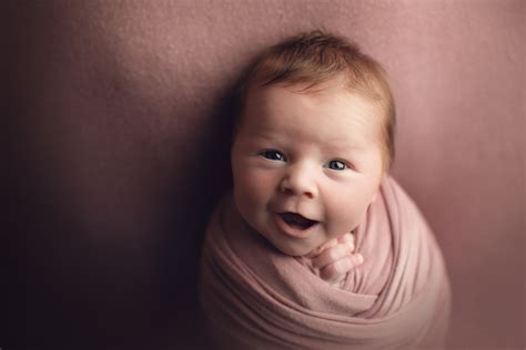Smiling Newborn Baby