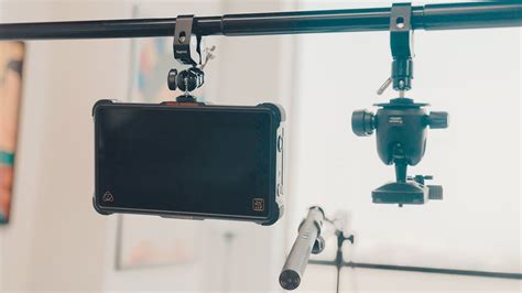For a very long time i've had the idea to make some sort of roof mounted overhead camera rig to improve the filming in my workshop. DIY Overhead Camera Rig - Take over head shots like a PRO! - YouTube