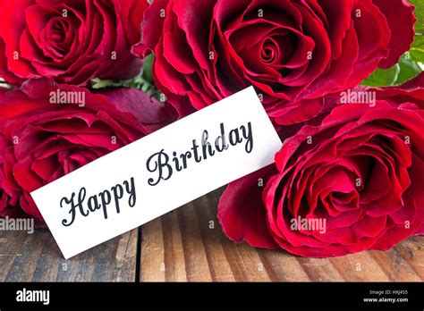 Happy Birthday Card With Bouquet Of Red Roses Close Up Stock Photo