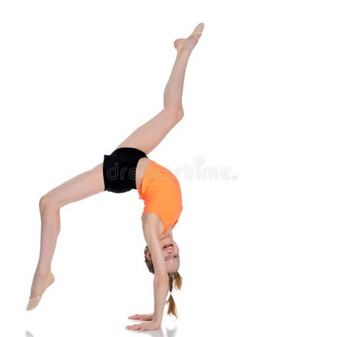 The Gymnast Performs A Handstand With Bent Legs Stock Image Image Of