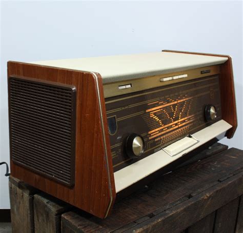 They are generated by an electronic device called a transmitter connected to an antenna which radiates the waves, and received by another antenna connected to a radio receiver.radio is very widely used in modern technology. Retro radio Philips Plano 2 - Roest Wonen
