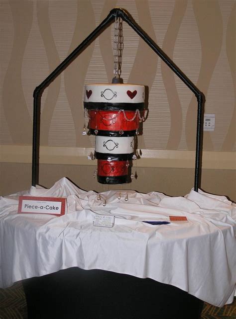 Chandelier cakes are unique and full of engineering! Chandelier Wedding Cake - Aislinn Events
