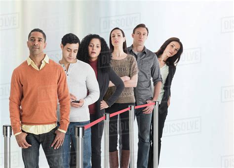 Group Of People Waiting In Line Stock Photo Dissolve