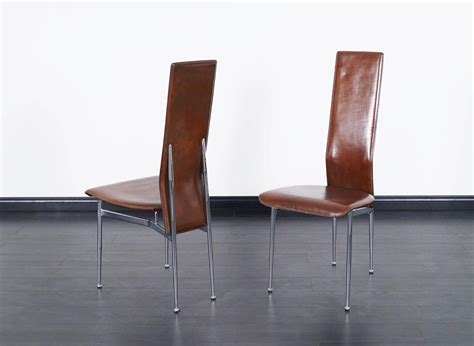 Call to schedule your showroom appointment. Italian Leather Dining Chairs For Sale at 1stdibs