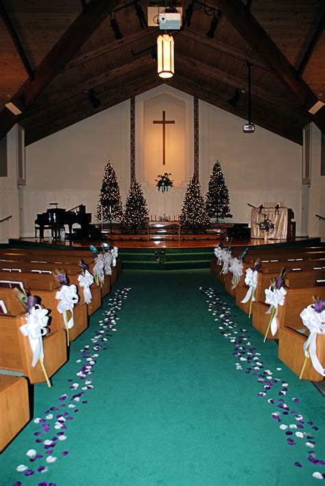 Church Decorations For A Winter Wedding Featuring Purple And Teal