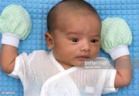 Baby Sleepsuit Photos And Premium High Res Pictures Getty Images