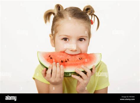 Cute Little Girl Eating Watermelon Slice Concept Of Healthy Eating