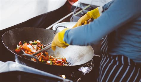 Person Cooking On Stainless Steel Cooking Pot · Free Stock Photo