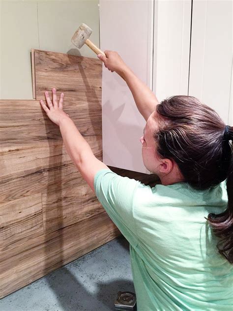 This was his girlfriends idea (part her and part their designer) well, after a separation and her moving out my client. Laminate Flooring Backsplash (It looks like WOOD!) (Bower ...