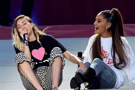 Miley Cyrus Recalls Playfully Flirting With Ariana Grande During 2015 Duet She Was A Little
