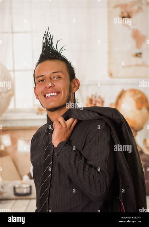 Close Up Of Happy Office Punk Worker Wearing A Suit With A Crest