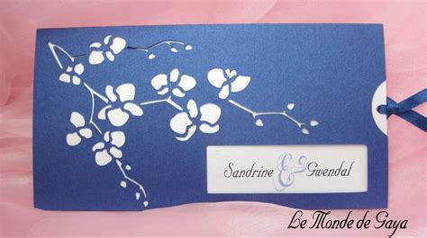 Pochettes costume pour homme 100% soie. Faire-part pochette orchidée bleu marine et blanc pour mariage