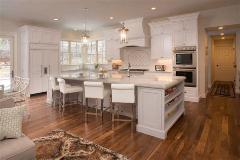 One common reason why homeowners avoid grey is the color s association with dullness modesty and boredom. White Kitchen with Light Grey Island - Crystal Cabinets
