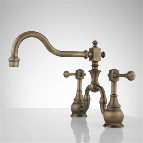 Bridge kitchen faucets feature a horizontal bar connecting hot and cold water handles to the spout. Vintage Bridge Kitchen Faucet - Lever Handles | Copper ...
