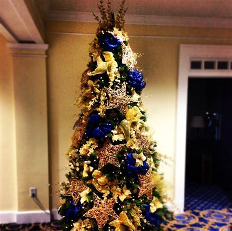 Christmas Tree In Navy Gold And Yellow Gold Christmas Decorations