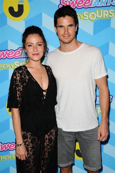 Italia Ricci And Robbie Amell At Just Jared Summer Bash Pool Party Celeb Donut