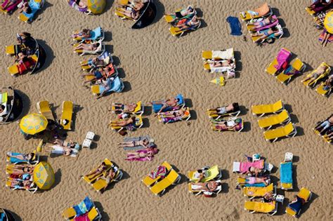 A Sky High View Of Sunbathers
