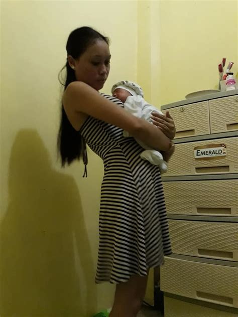 Larawan Ng Isang Babae Habang May Buhat Na Baby Nakakakilabot News