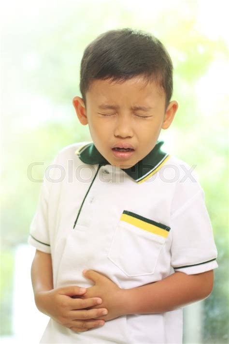 Little Boy Suffering From Stomach Pain Stock Image Colourbox