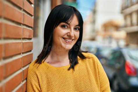 Young Brunette Woman Smiling Happy Leaning On Bricks Wall Stock Image Image Of Standing