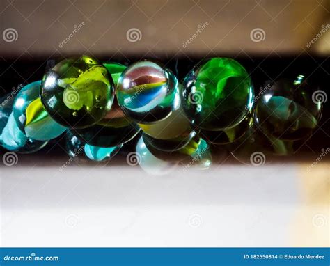 Colored Clear Glass Marbles Stock Photo Image Of Yellow Vessel