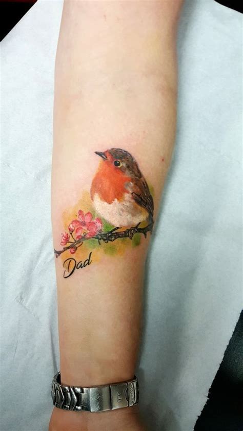The purple bird has a cross on its chest, the blue bird is holding a mauve rose, all three creatures are displayed in dynamics. Pin on tattoo