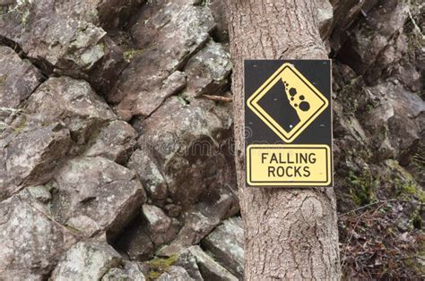 Falling Rocks Ahead Road Sign Stock Image Image Of Safety Travel