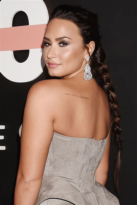 Demi Lovato Straight Dark Brown Braid Peek A Boo Highlights Hairstyle