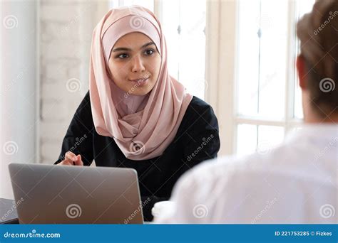 beautiful asian muslim businesswoman talking with colleague at meeting stock image image of