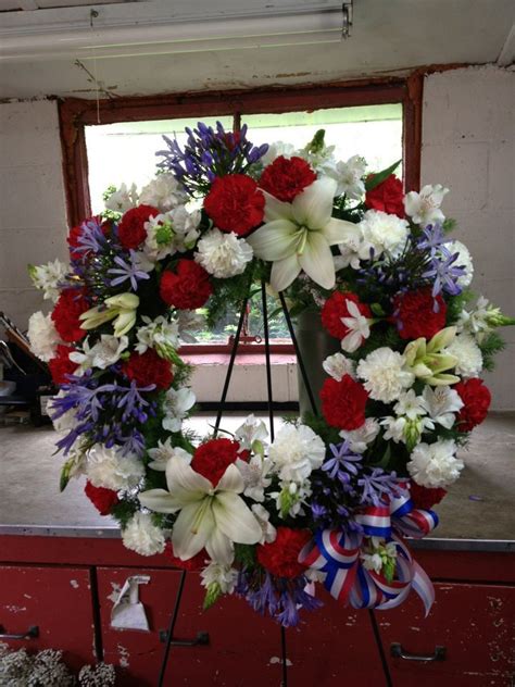 ^ foxglove symbolism and the meaning of foxgloves in the language of flowers. Memorial Day Wreath being displayed at the local Police ...