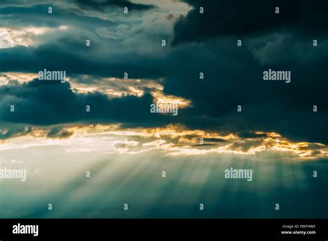 Sunshine Through Dark Clouds Hi Res Stock Photography And Images Alamy