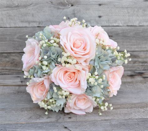 Maybe you would like to learn more about one of these? Coastal, vintage inspired silk wedding bouquet made with ...