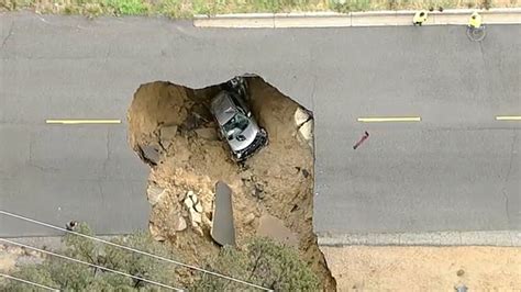 Massive Sinkhole Swallows Cars In Chatsworth Prompting Rescue Youtube