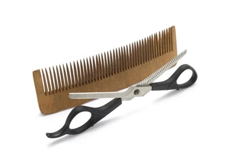 Scissors And Comb Stock Photo By ©ekostsov 28729499