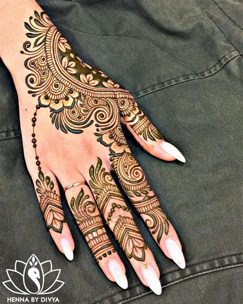 Modern Unique Mehndi Designs For Back Hands