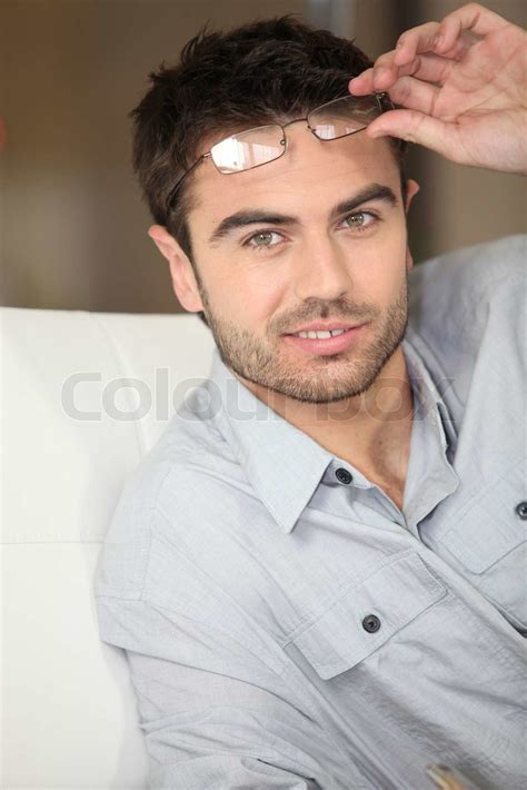 Man Taking His Glasses Off Stock Image Colourbox