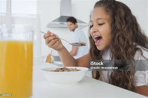 Cute Little Girl Eating Cereals Stock Photo Download Image Now 20