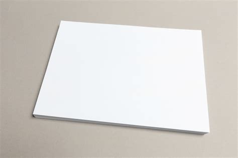 Premium Photo Blank Paper On Wood Table
